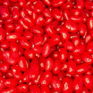 Kleine, glanzende rode jelly beans boordevol sappige, fruitige smaak. Deze klassieke snoepjes zijn perfect om je zoetekauw te verwennen met een intense en langdurige smaakexplosie.